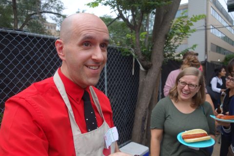Author and illustrator Evan Munday works the grill