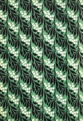 light green endpaper with black leaf and white berry pattern